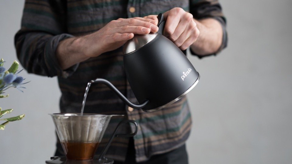 Pouring from a Primula gooseneck kettle into a pour-over cone