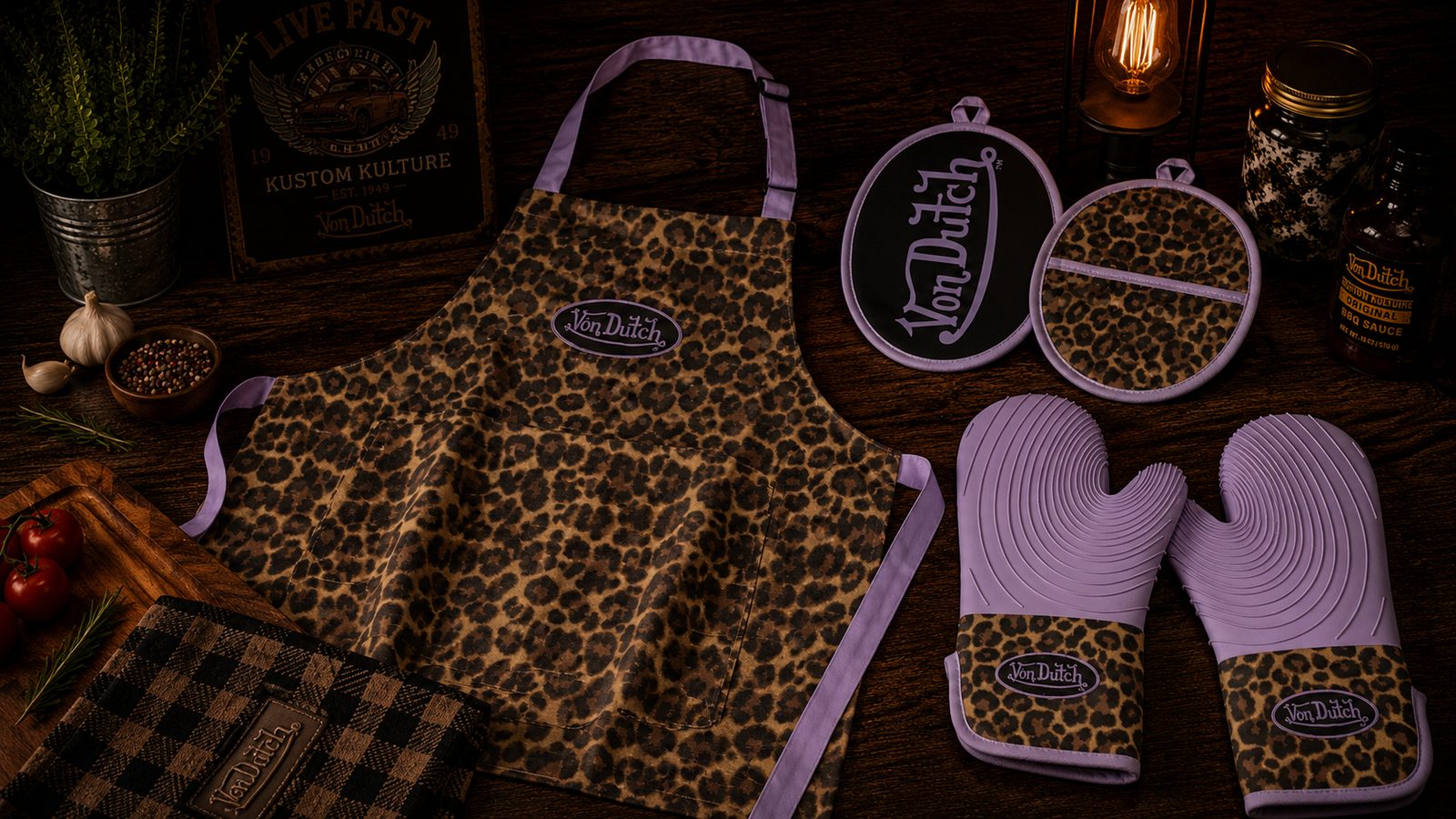 Von Dutch leopard print apron, oven mitts and trivets